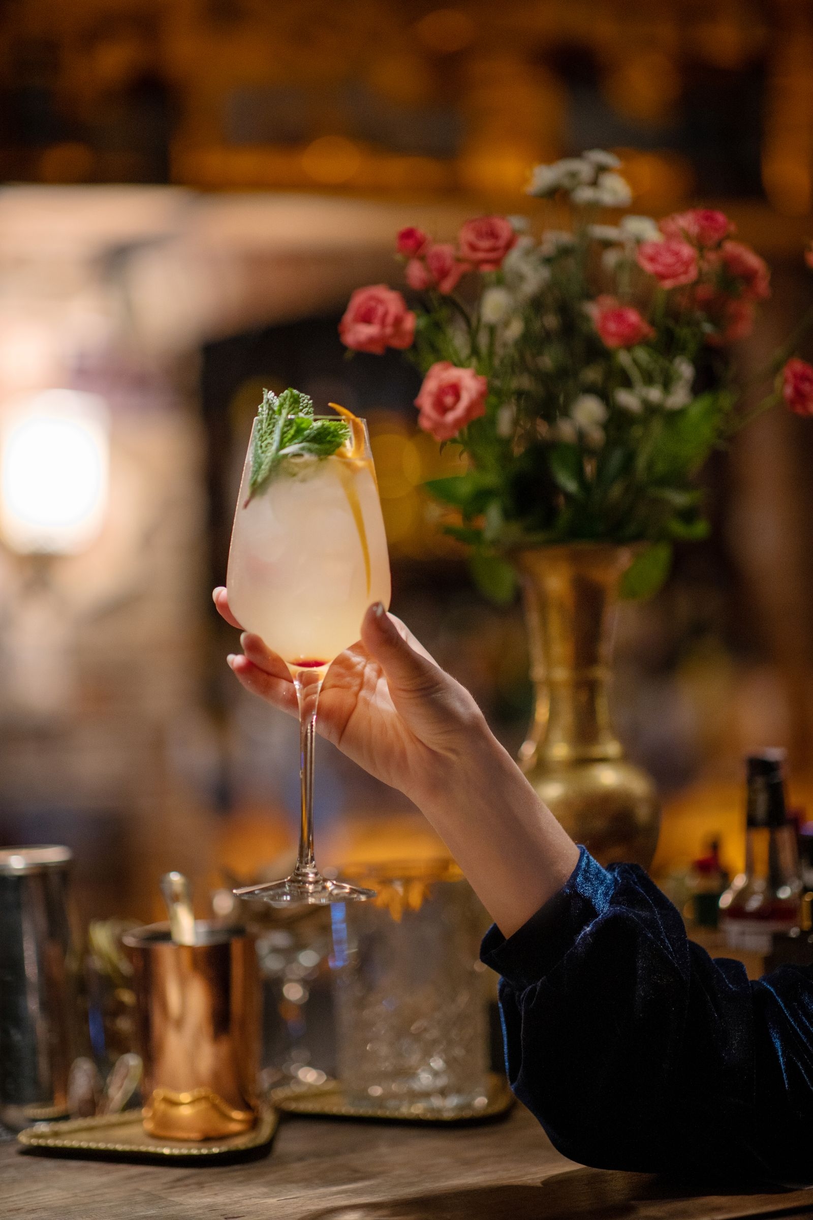 Guest with a cocktail in the lounge