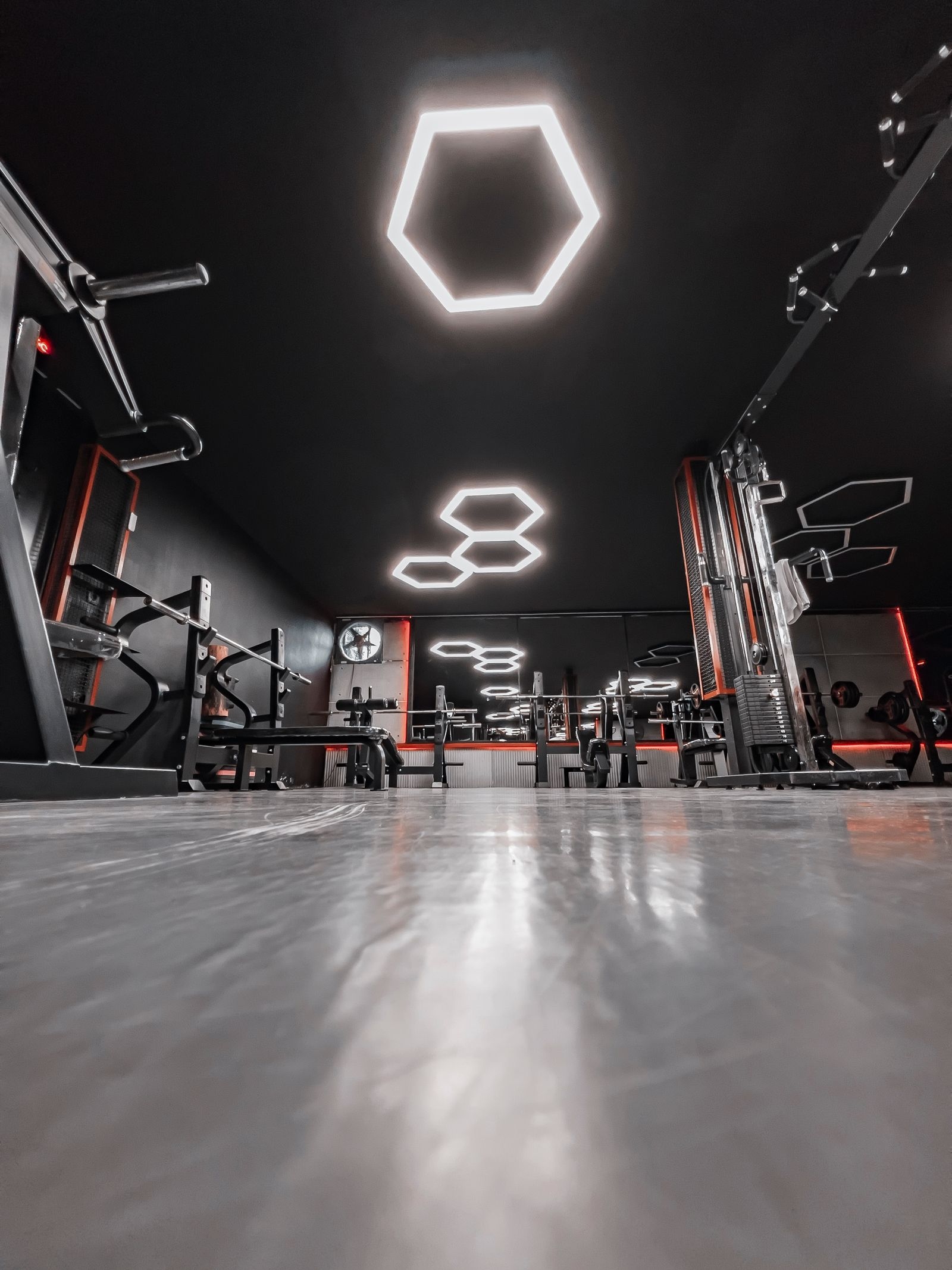 Modern gym interior with dramatic lighting